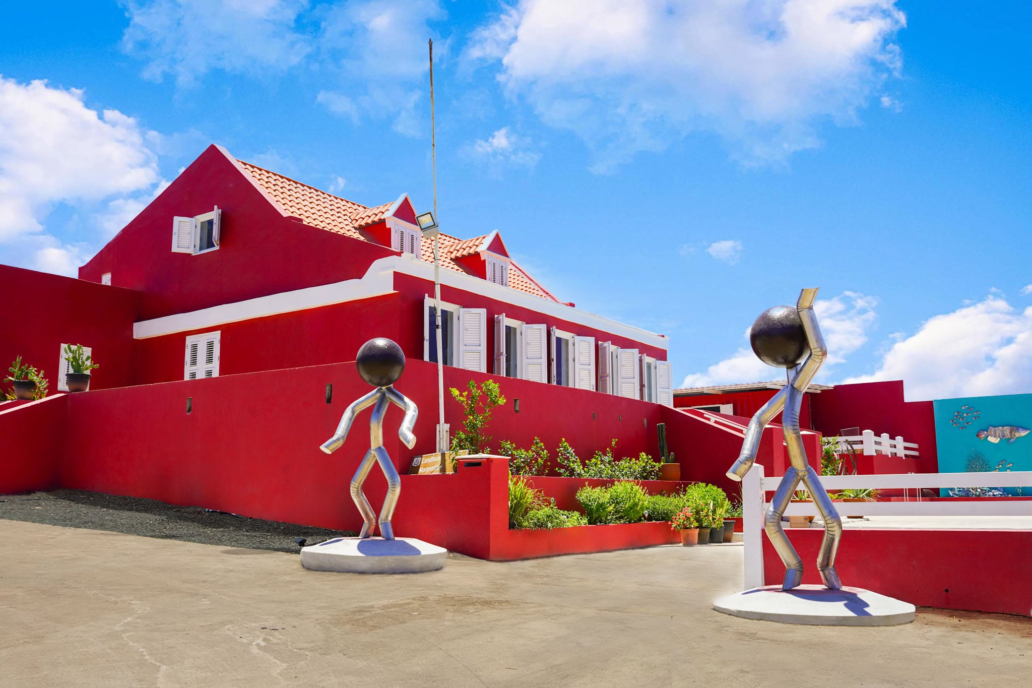 Historic Landhuis Morgenster mansion with contemporary steel sculptures